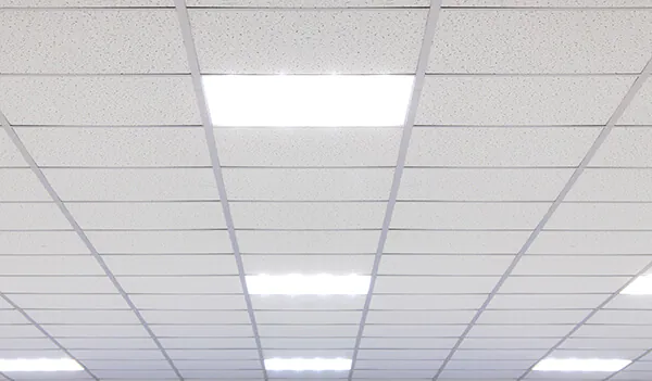 Louvre ceiling with LED panels as recessed luminaires